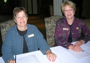 Carol & Suzie registering members at workshop